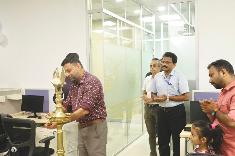 CEO Technopark lighting the inaugural lamp.
