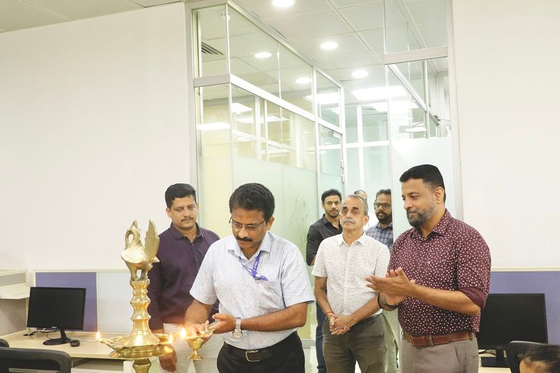 Mr. Dhanoor CV, ADC, Trivandrum SEZ, lighting the inaugural lamp.