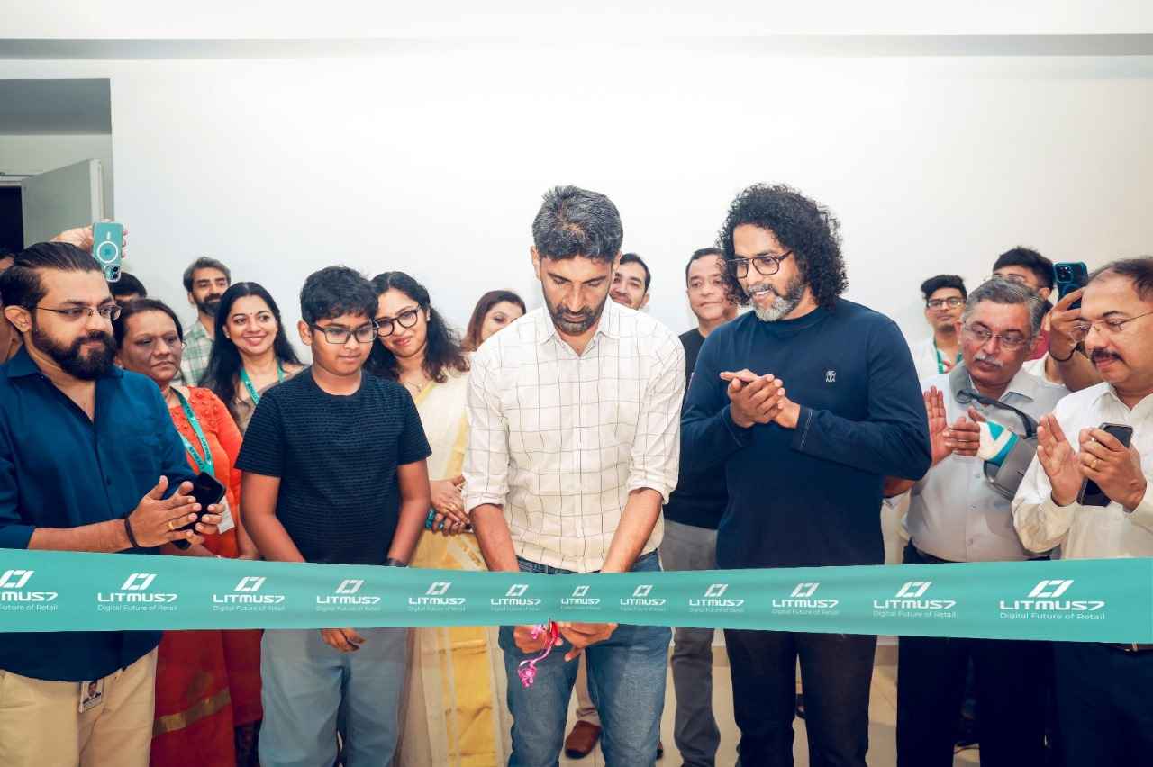 Special guest with the CEO of Litmus7, Mr. Venu Gopalakrishnan, at the ribbon cutting ceremony.