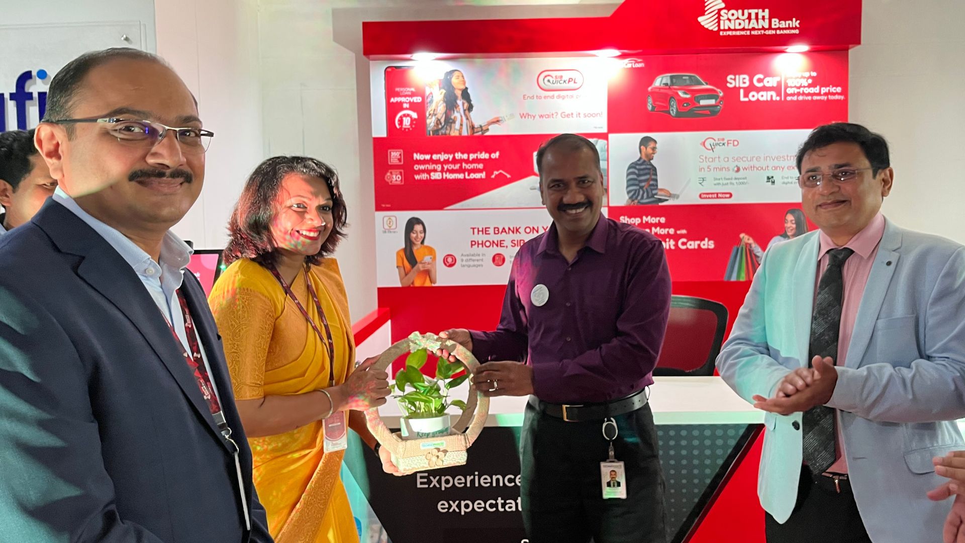 Sri Vipin Kumar S presenting a memento to Ms. Dhanasree V R, Branch Head, SIB, Technopark.