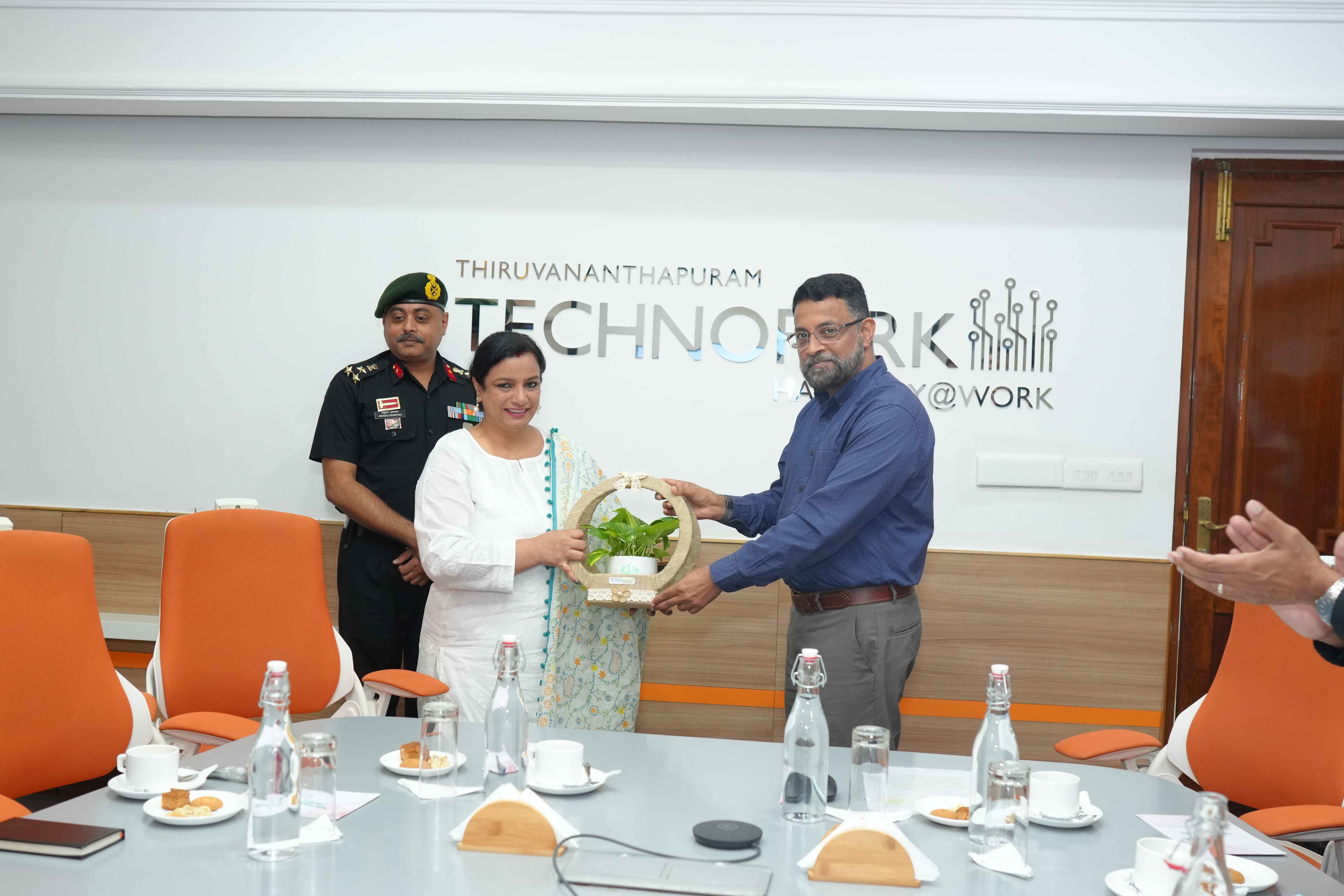 CEO Technopark presenting a token of appreciation to Mrs. Upadhyaya.