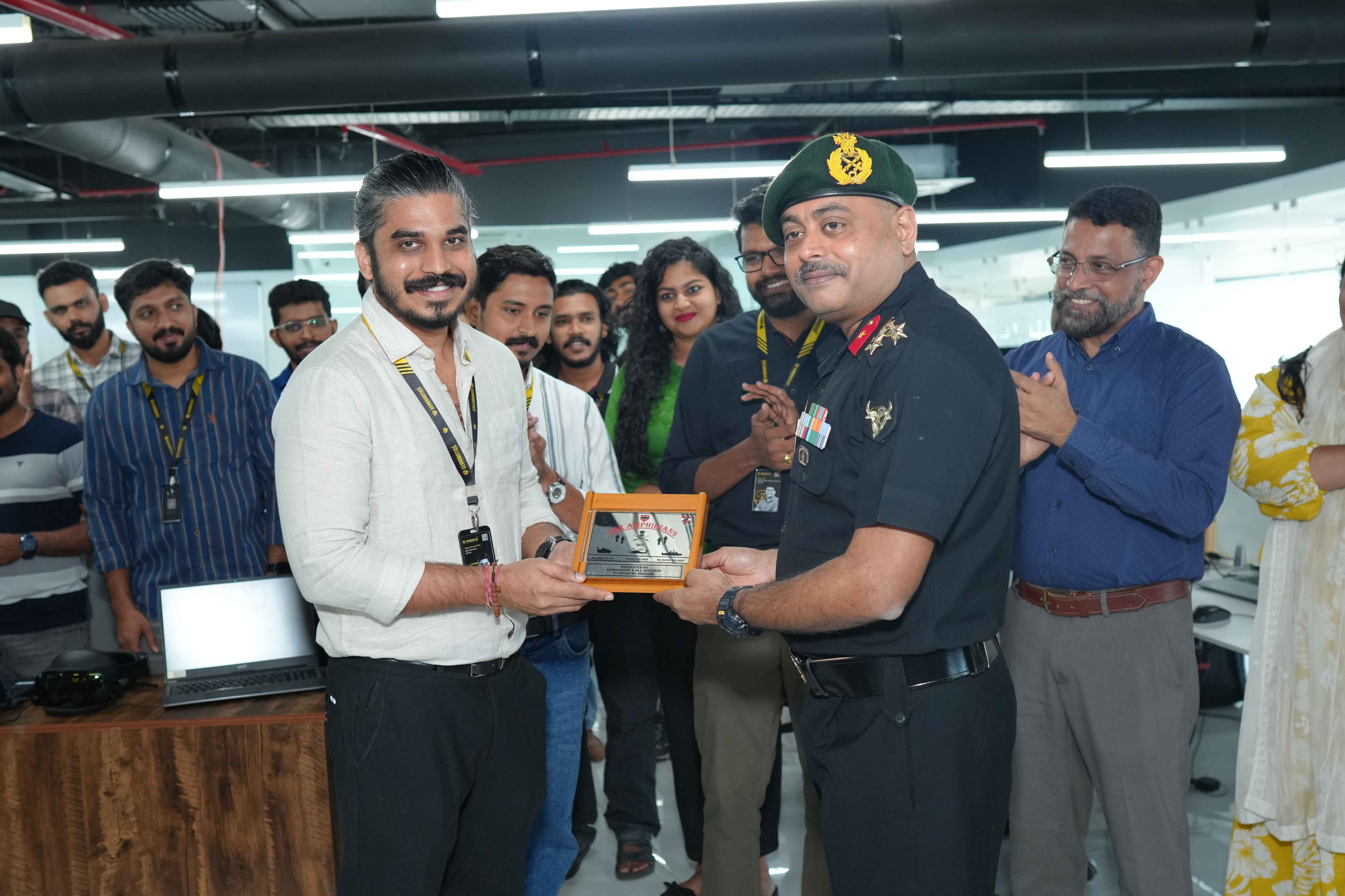 Brigadier Anurag Upadhyaya with Mr. Vimal Govind, Co-founder and CEO, Genrobotics.
