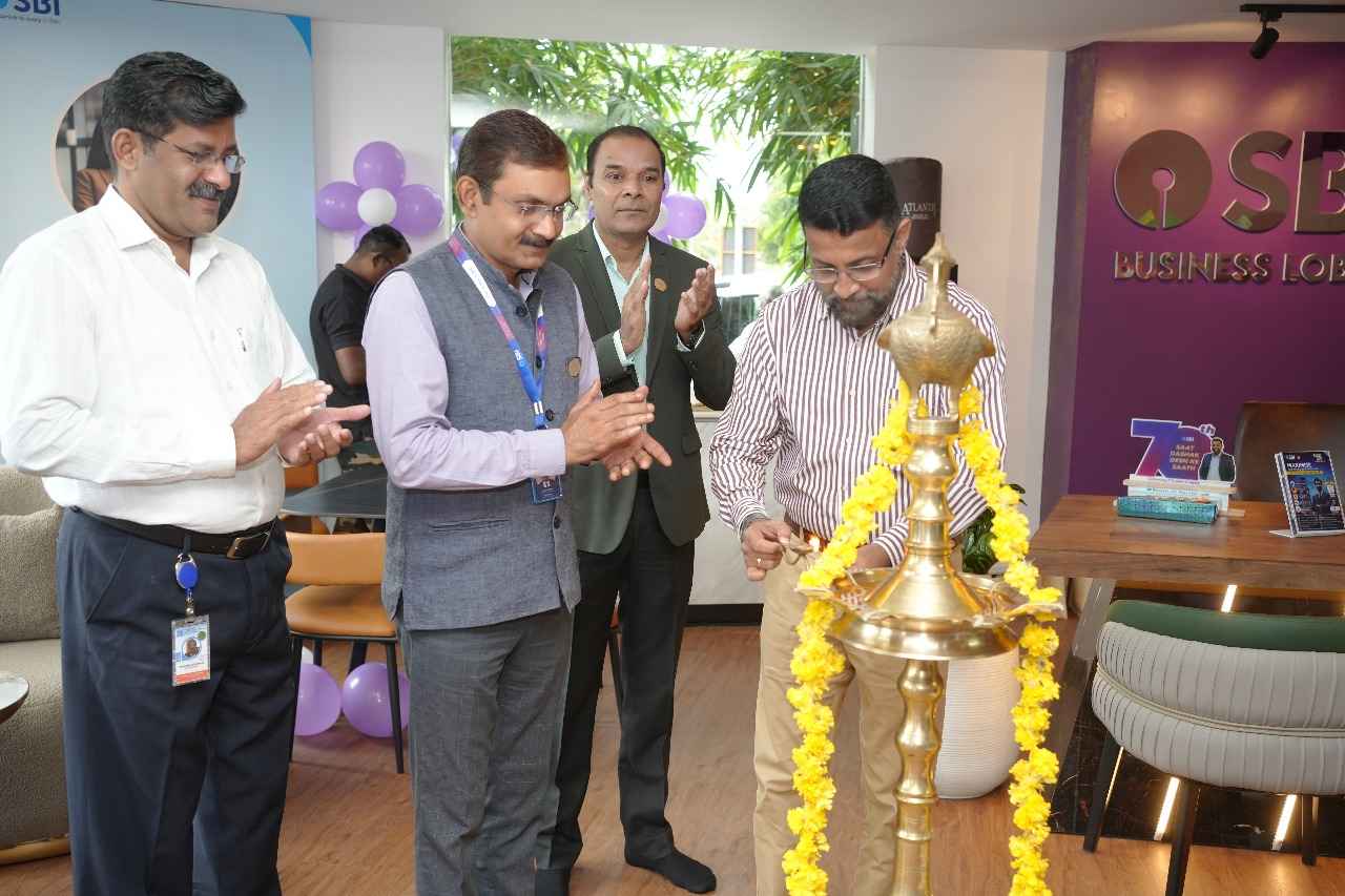 Col Sanjeev Nair (Retd) lighting the inaugural lamp, as Shri Muraleedharan Manningal, CEO, ICTAK; Shri Sushil Kumar; and Shri Ashok Kumar Divakar, look on.