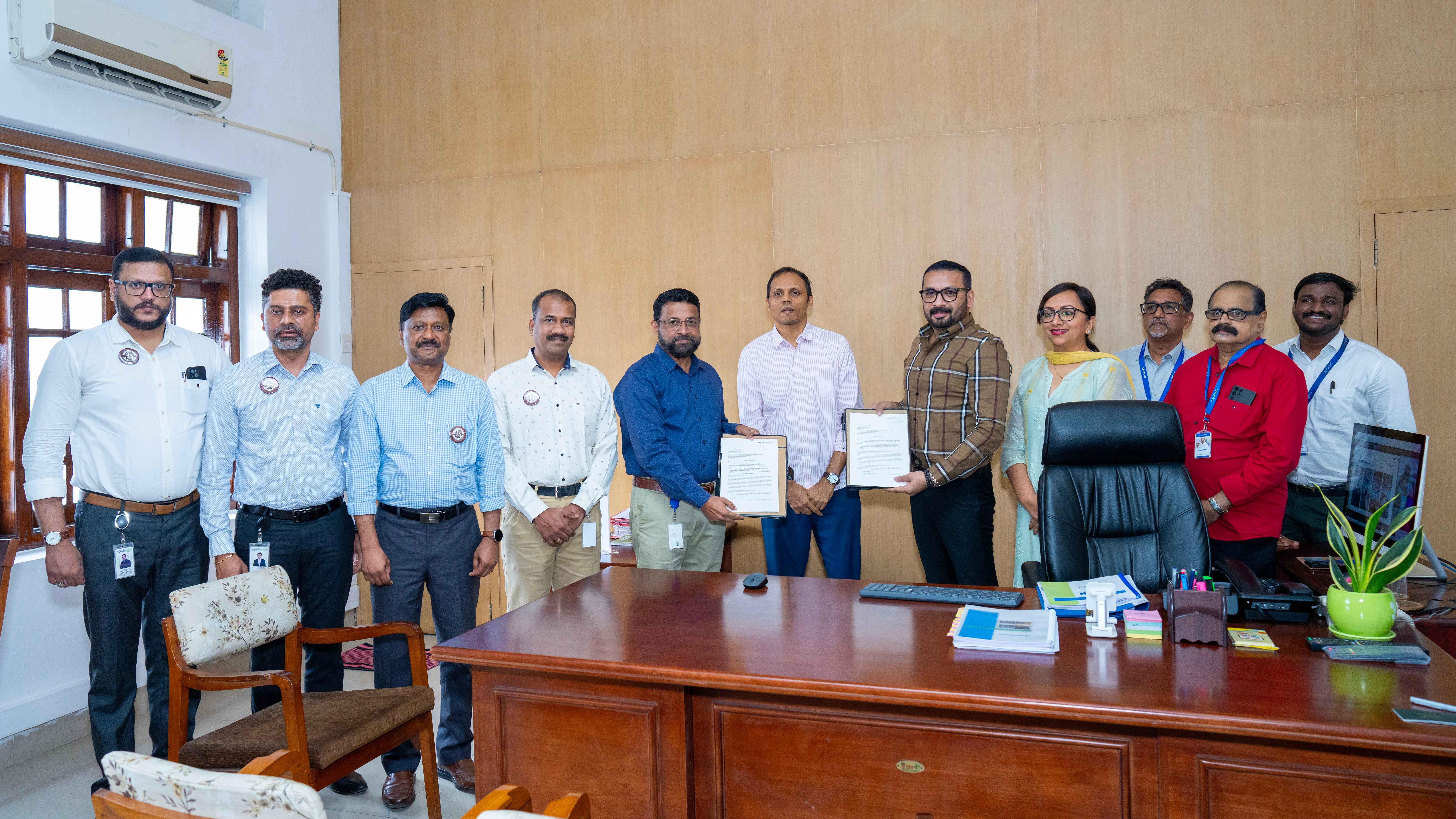 The handing over of the Letter of Intent by Col Sanjeev Nair (Retd), CEO Technopark, to  Mr. Thomas Chacko, MD, Caspian Techparks India, for the construction of Caspian's new office at Technopark Phase I.