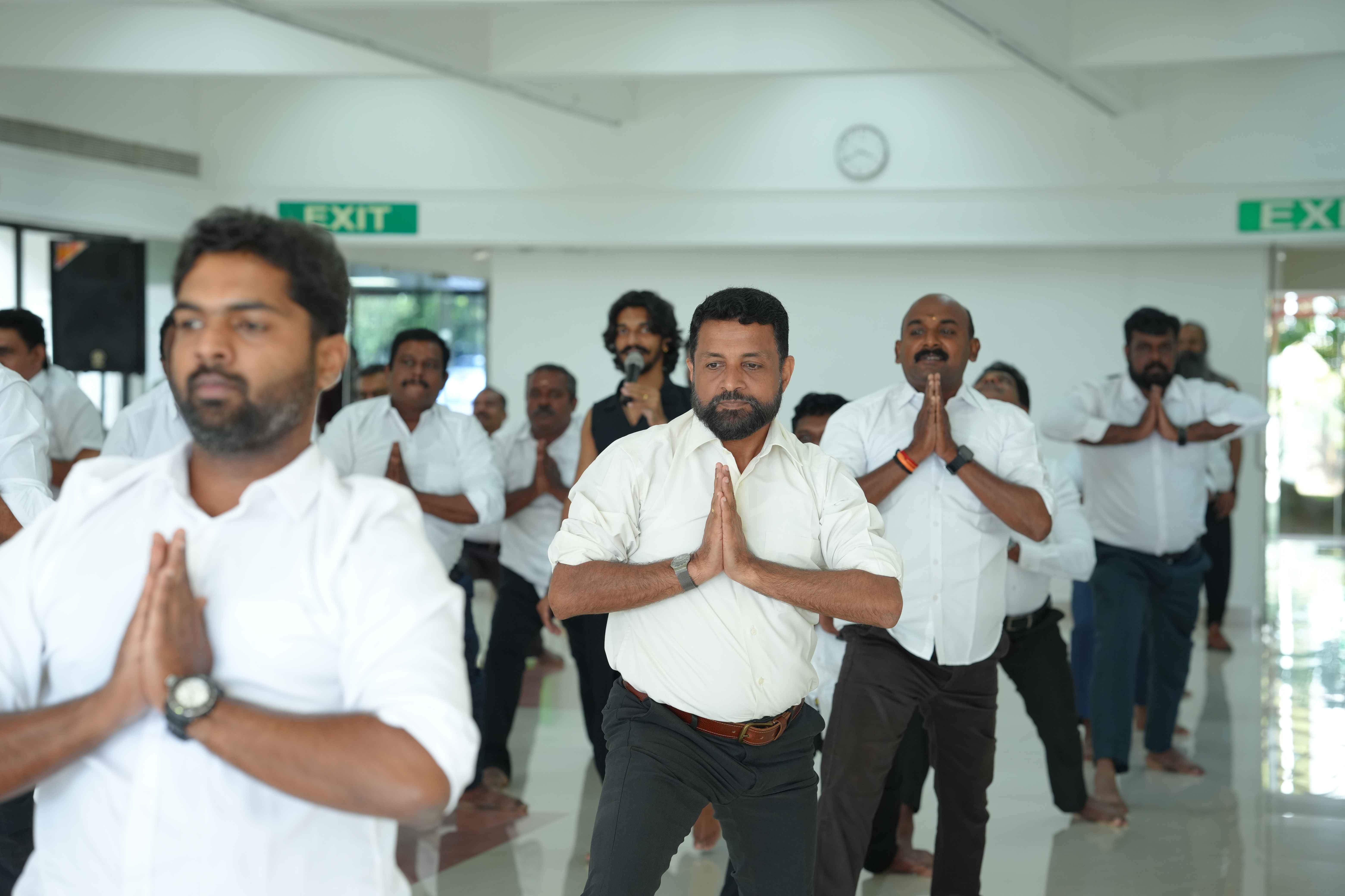 Col Sanjeev Nair (Retd) with Park Centre employees, participating in a wellness session that fostered positivity, resilience, and mindfulness.