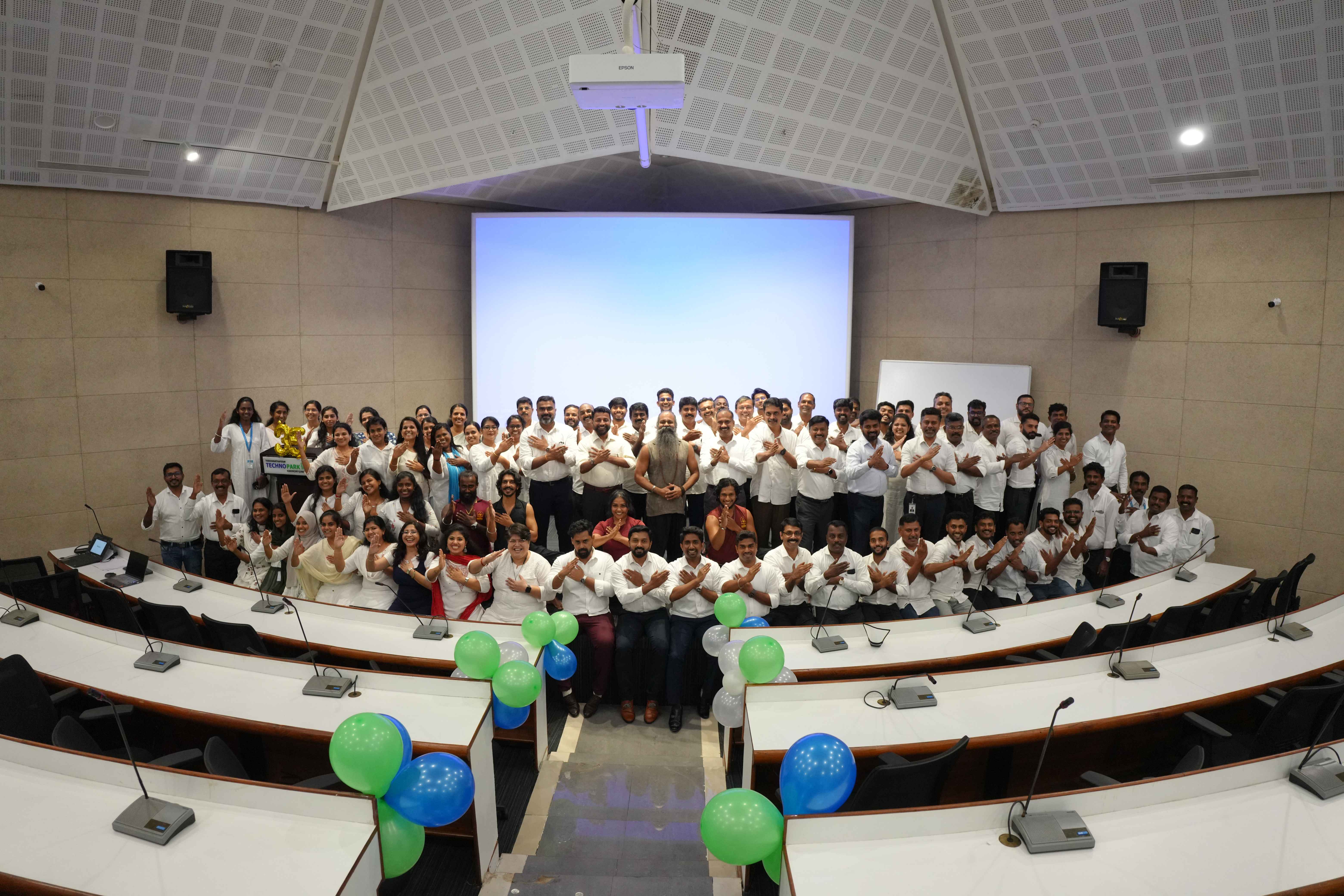 Park Centre employees gathered for a wellness program as a part of Technopark's 35th anniversary. Here, seen with Gurukkal Dr. S Mahesh of the Agasthyam Foundation.