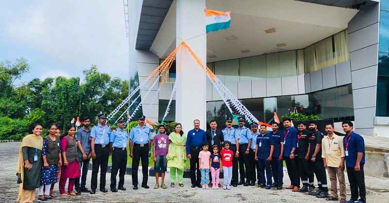 Phase V staff with families at the Independence Day celebrations.