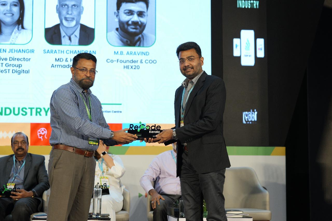 Col. Sanjeev S. N.(Retd.), CEO Technopark, honoring Aravind M B- Co-founder & COO, HEX20